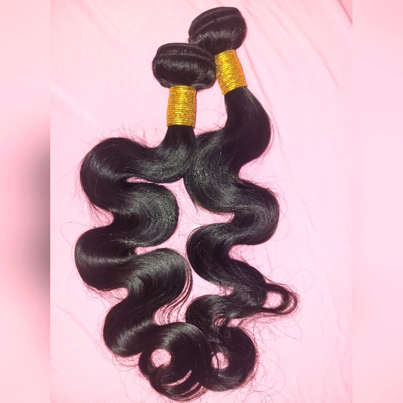 Brazilian hair %100 human natural you can dye it best rated I have wavy lazio an